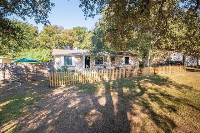 12614 Crystal Creek Dr, Buda, TX 78610 - rear view of property with stone siding