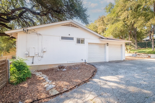 view of home's exterior featuring a garage