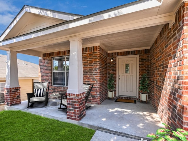 doorway to property featuring a porch