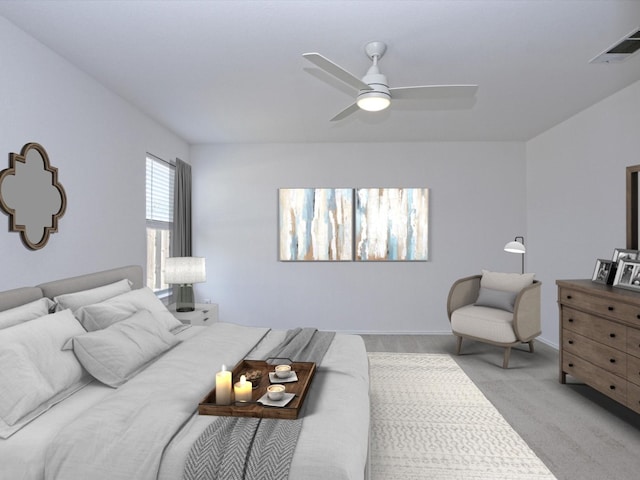 bedroom with ceiling fan and light carpet