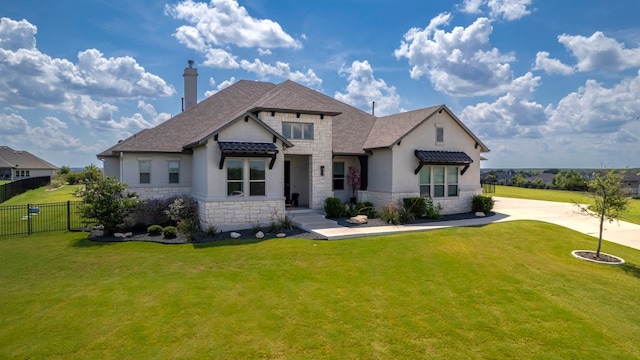 view of front of house with a front lawn