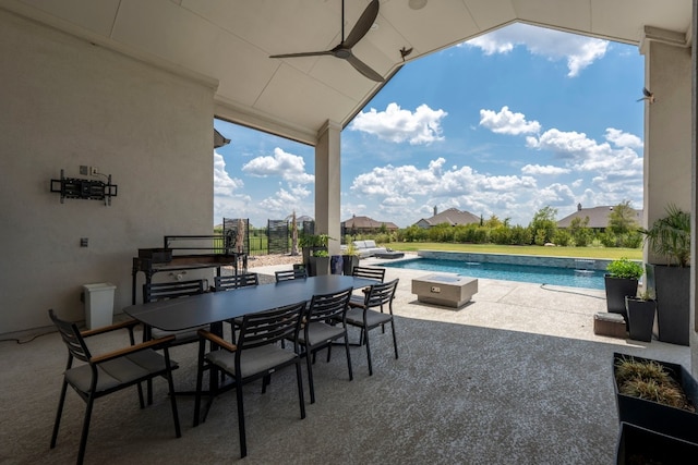 view of patio featuring ceiling fan