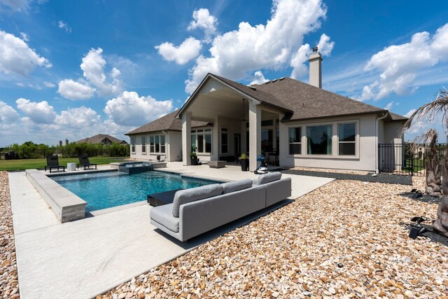 view of swimming pool with a patio and an outdoor hangout area