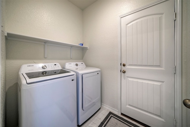 laundry room with washer and clothes dryer