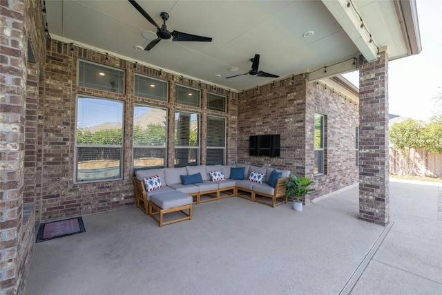 view of patio / terrace featuring ceiling fan and outdoor lounge area