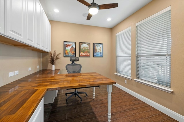 office featuring ceiling fan and dark hardwood / wood-style flooring