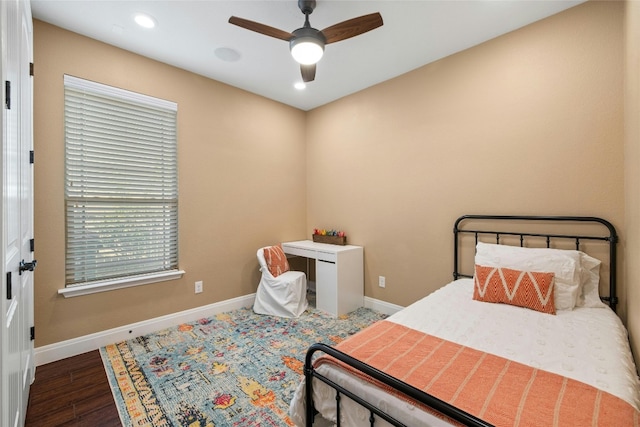 bedroom featuring hardwood / wood-style floors and ceiling fan