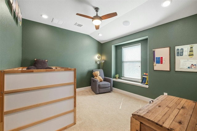 carpeted bedroom featuring vaulted ceiling and ceiling fan