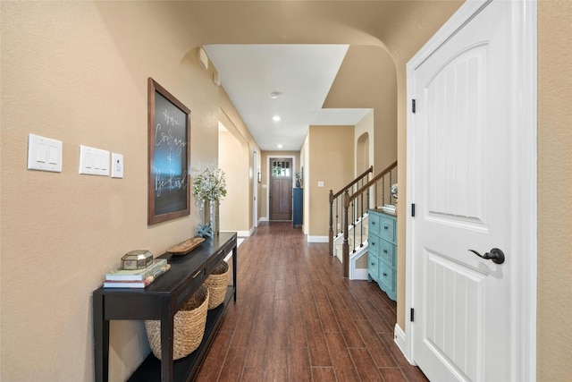 hallway with dark wood-type flooring