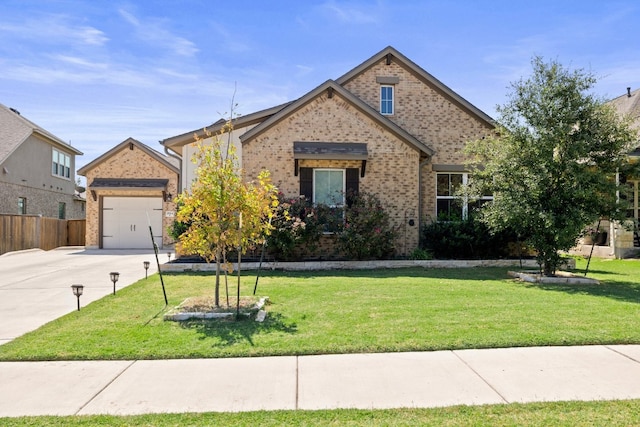 view of front facade featuring a front yard and a garage