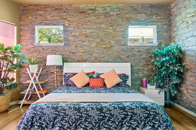 bedroom featuring hardwood / wood-style flooring