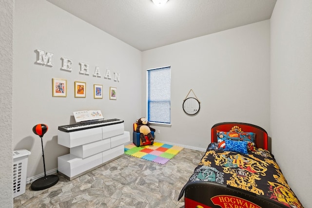 bedroom featuring a textured ceiling