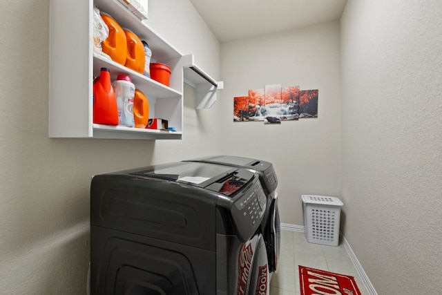 laundry area with separate washer and dryer