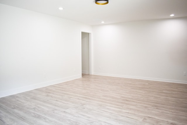 unfurnished room featuring light wood-type flooring