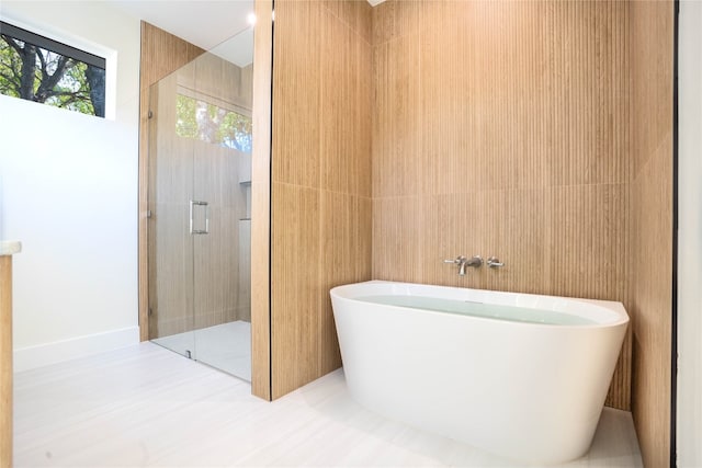 bathroom with independent shower and bath