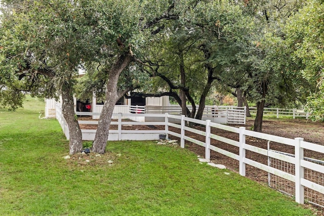 view of yard with an outdoor structure and an exterior structure