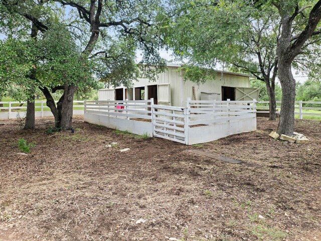 manufactured / mobile home with an outbuilding and an exterior structure