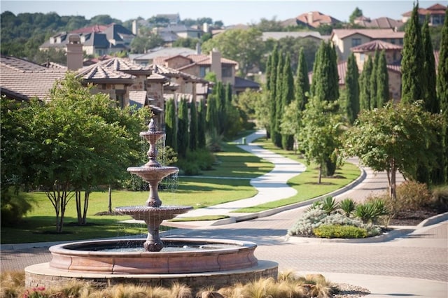 surrounding community featuring a lawn