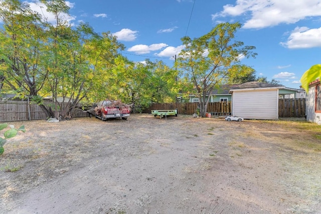 view of yard with a shed