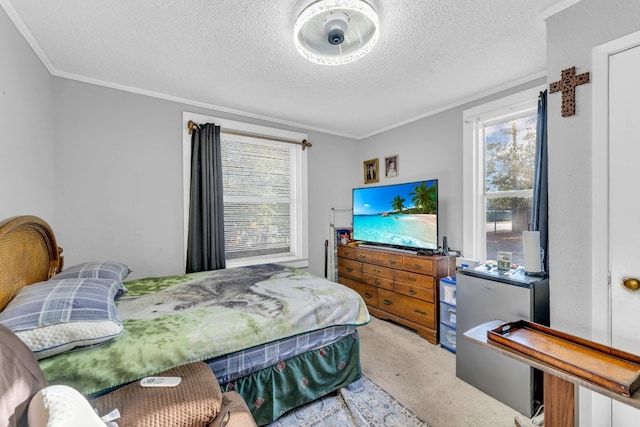 carpeted bedroom featuring ornamental molding, a textured ceiling, and multiple windows