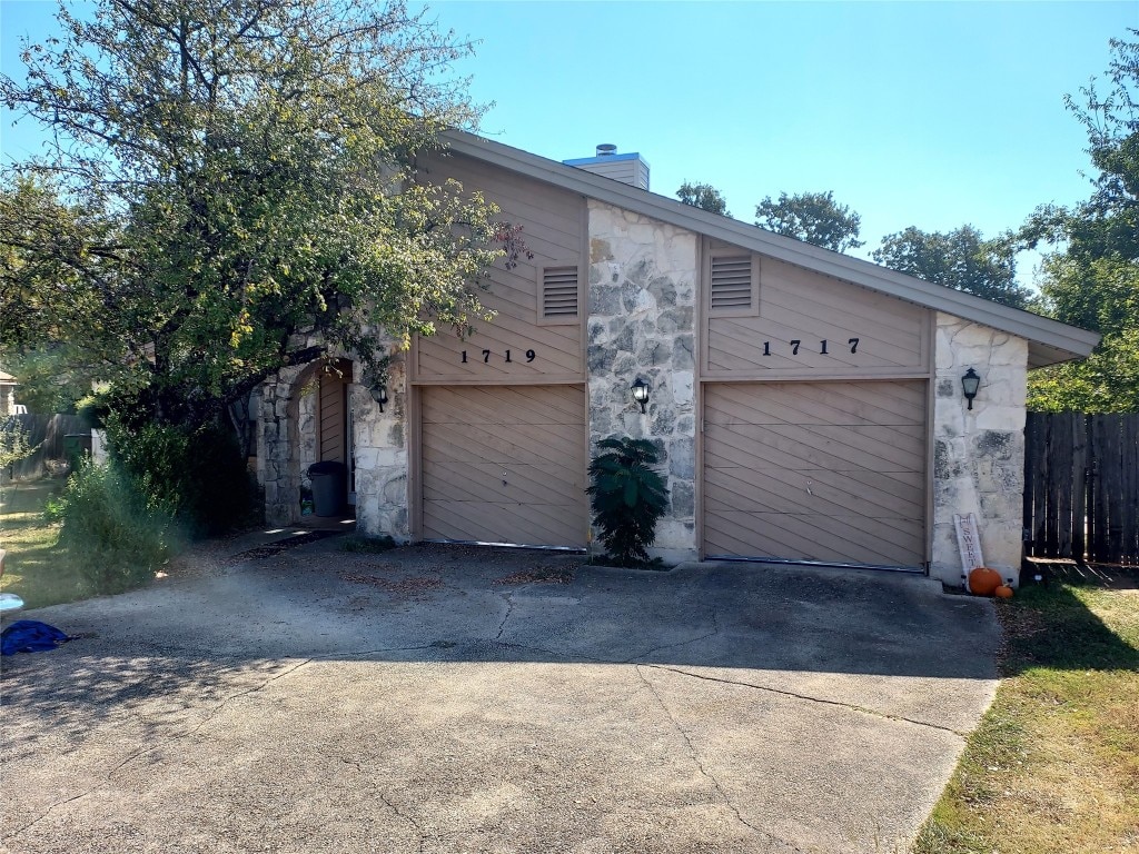 view of front of home with a garage