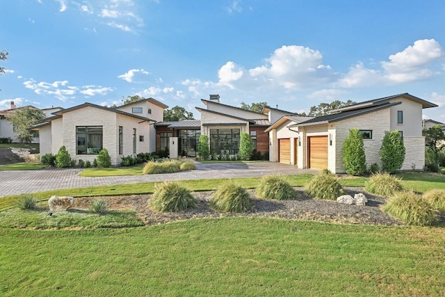 501 Delayne Dr, Austin, TX 78737 - view of front of property featuring stone siding, asphalt driveway, and a front yard