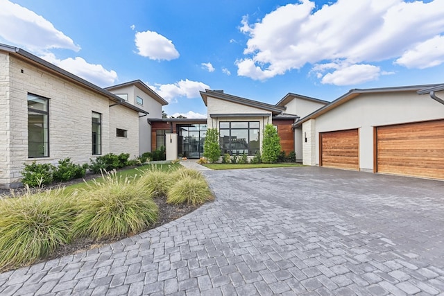 modern home featuring a garage