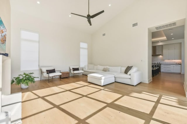 501 Delayne Dr, Austin, TX 78737 - living area with high vaulted ceiling, wood finished floors, and ceiling fan