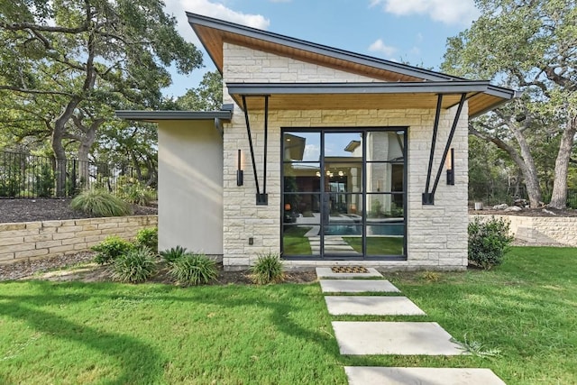 501 Delayne Dr, Austin, TX 78737 - entrance to property featuring stone siding