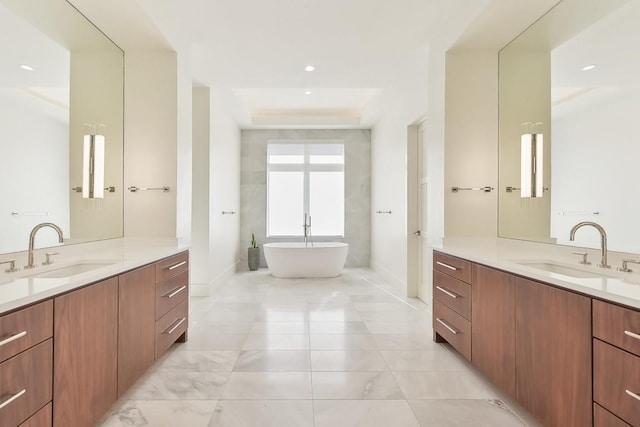 501 Delayne Dr, Austin, TX 78737 - full bath with two vanities, a soaking tub, and recessed lighting