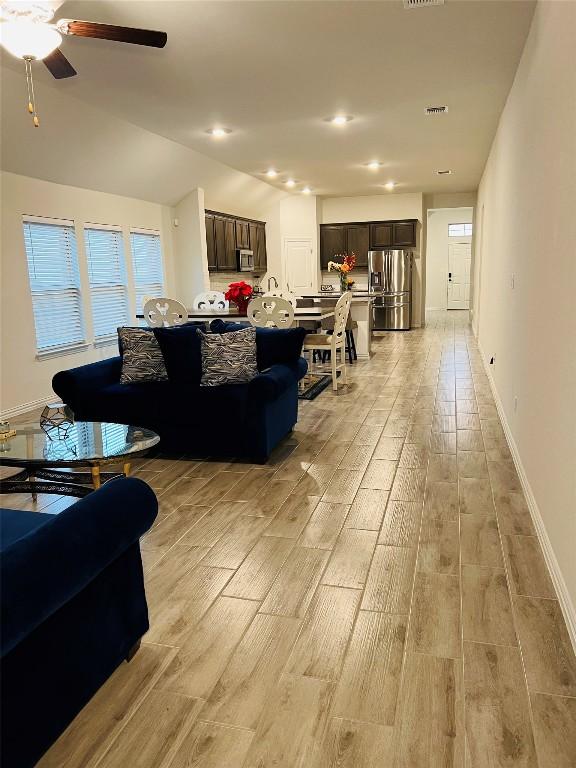 living room with ceiling fan