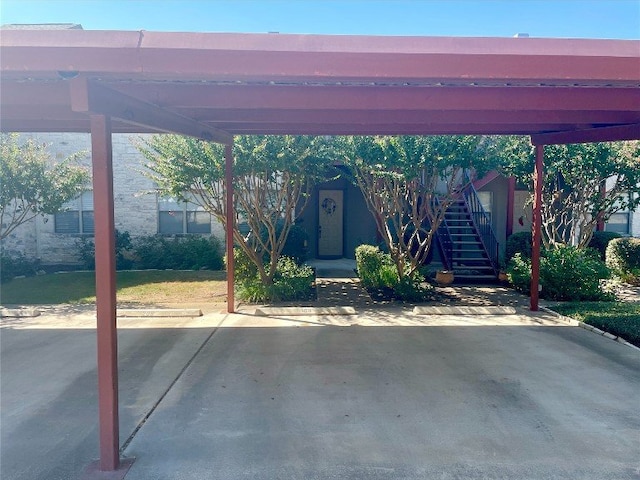 view of patio / terrace featuring a carport