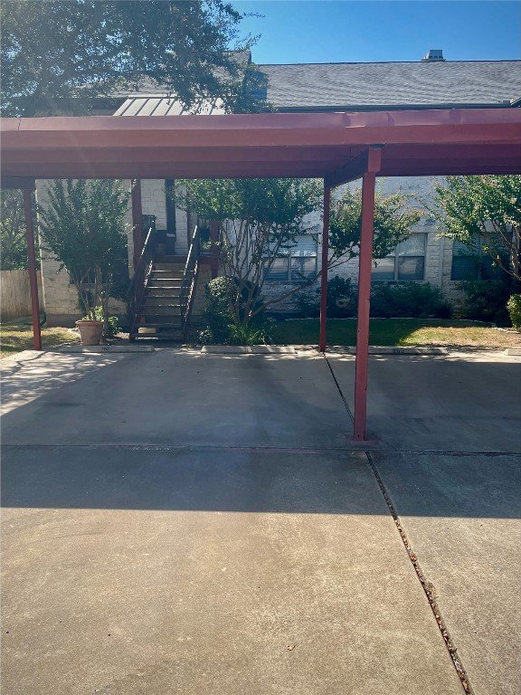 view of car parking with a carport