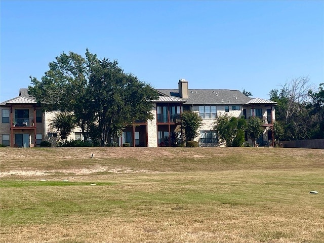 exterior space with a front yard