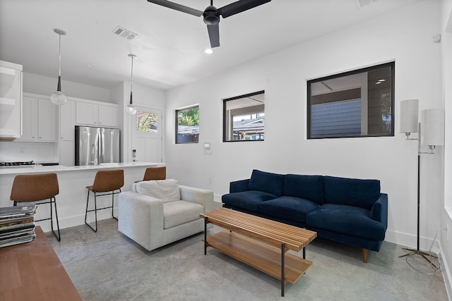 living room with ceiling fan