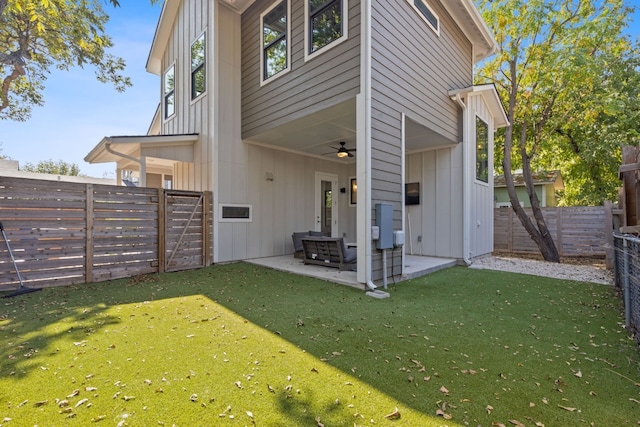 exterior space with a yard, a patio area, and ceiling fan