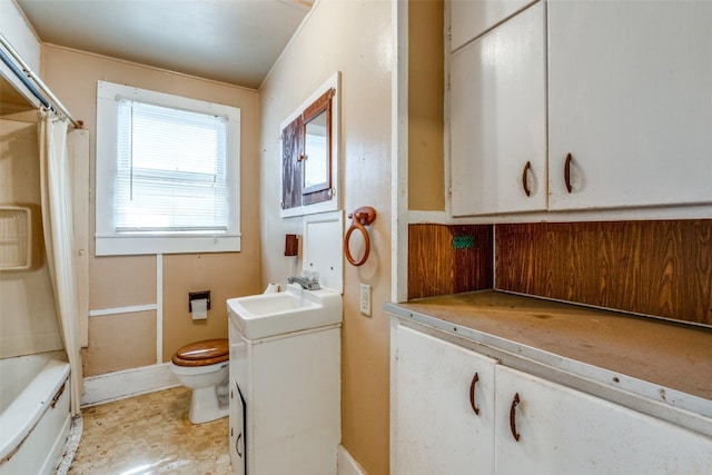 full bathroom with toilet, shower / tub combo with curtain, and vanity