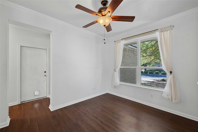 spare room featuring ceiling fan, ornamental molding, and dark hardwood / wood-style flooring