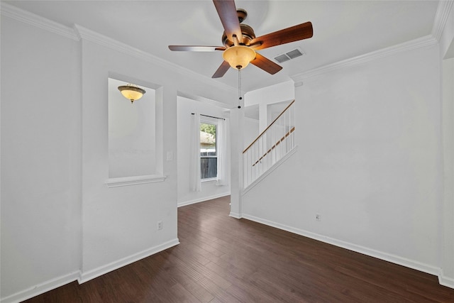 unfurnished living room with dark hardwood / wood-style floors, ornamental molding, and ceiling fan