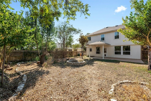 rear view of house featuring a patio area