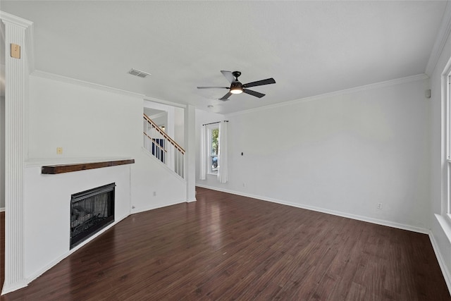 unfurnished living room with ornamental molding, ceiling fan, and dark hardwood / wood-style flooring