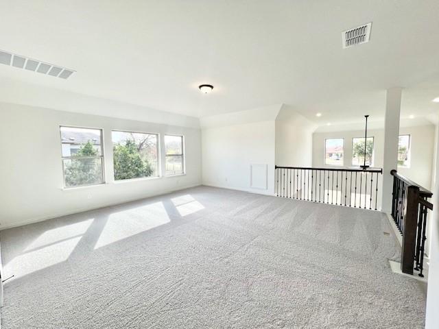 empty room featuring carpet flooring