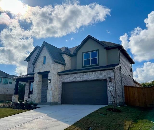 view of front of home with a garage