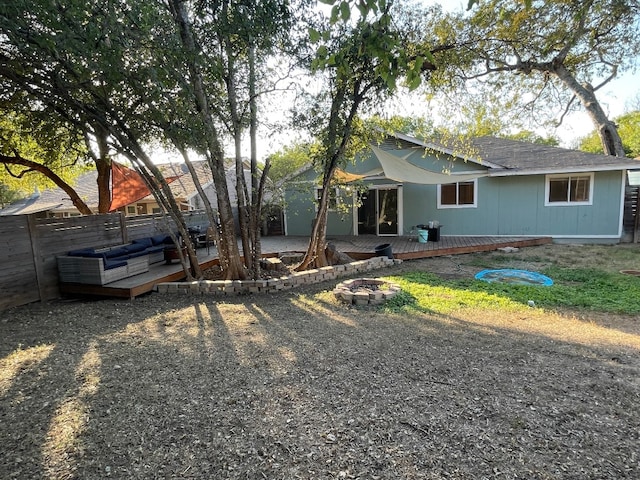 rear view of house with an outdoor hangout area, a deck, and a patio