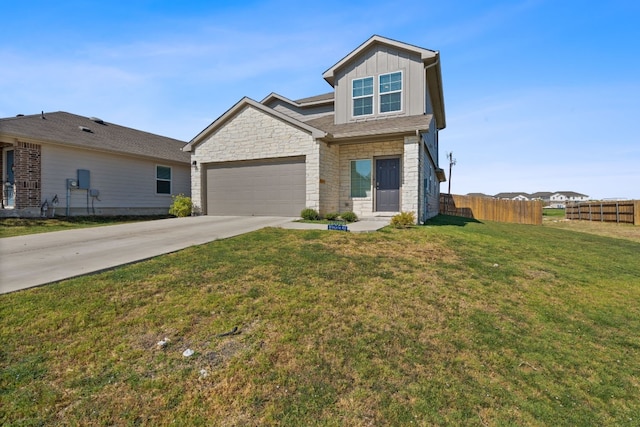 view of front of property with a garage and a front yard