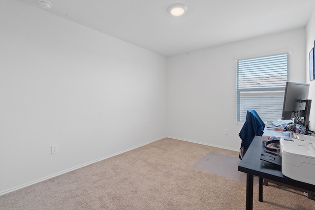 unfurnished office with light colored carpet