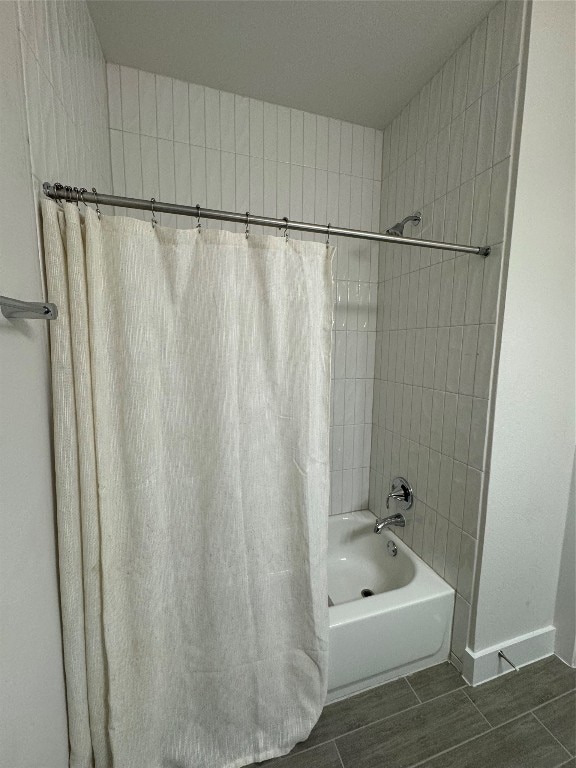 bathroom with shower / tub combo