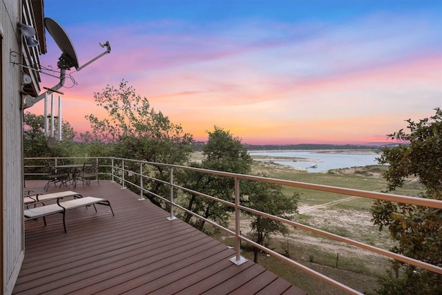 deck at dusk with a water view