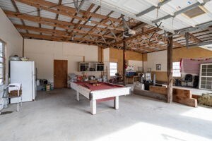 garage with white fridge