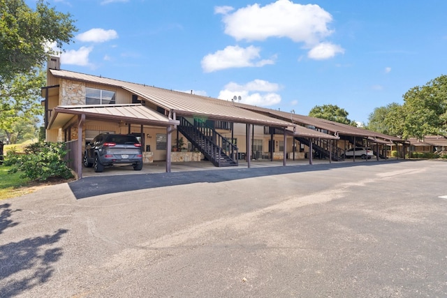 view of parking with a carport